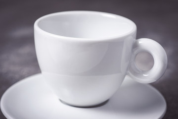 Empty White Espresso Coffee Cup on Dark Background