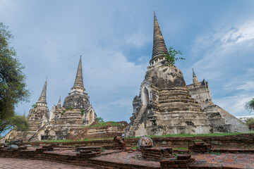 Fototapeta premium Ancient pagoda history of Wat Prasrisanpet in Ayutthaya historical park,Thailand. it is very popular with tourists and foreigners