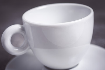 Empty White Espresso Coffee Cup on Dark Background