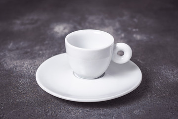Empty White Espresso Coffee Cup on Dark Background