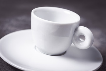 Empty White Espresso Coffee Cup on Dark Background