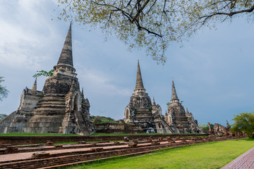 Fototapeta premium Ancient pagoda history of Wat Prasrisanpet in Ayutthaya historical park,Thailand. it is very popular with tourists and foreigners
