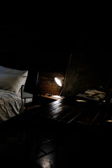 bed in dark room on film simulation
