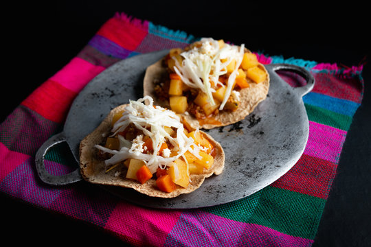 Traditional enchiladas from honduras with lenca background
