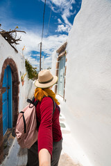 Couple Traveling. Woman holding hand with Man and leading the Way to New Places