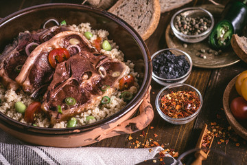 Roasted Lamb Loin Chops with Soybean and Couscous in Rustic Dish