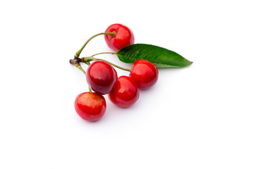 bunch of red ripe sweet cherries on a white background