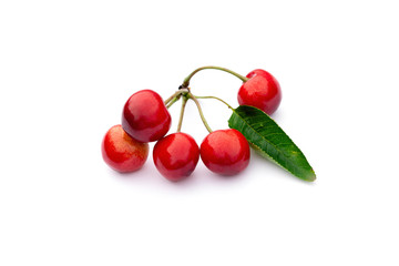 bunch of red ripe sweet cherries on a white background