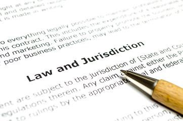 Law and jurisdiction with wooden pen