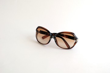 Sunglasses on a white background. Space for text.