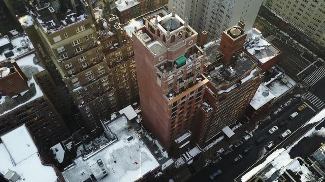 Tilt down aerial, downtown New York City in winter