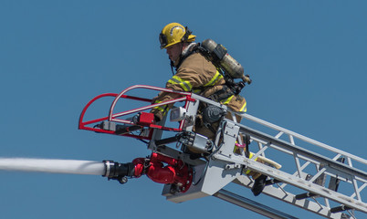 Ladder Pipe Master Stream in Use at a multiple dwelling