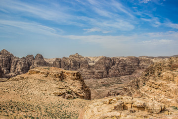 picturesque scenery landscape photography of wilderness and dangerous dry stone sharp rocky mountains and canyons natural environment in Middle East region of Earth, which belong to Bedouins 