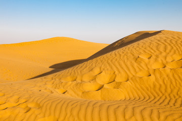 Fototapeta na wymiar Sand dunes at sunset