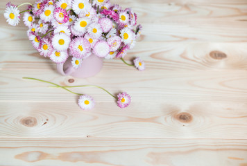 Pink Daisies Bouquet. Daisy Flowers on Wooden Background. Copy Space