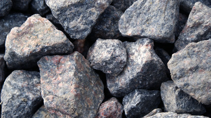 beautiful textural background from a natural stone, natural crushed stone of saturated color
