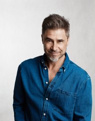 Fototapeta premium Goodlooking older man in casual shirt smiling