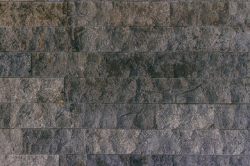Floor tiles with a grey stone rocky texture – Decorative and ornamental material used for pavement of the streets and alleys or building exteriors