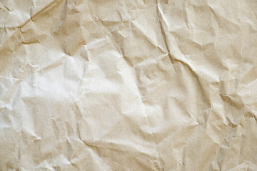 Crumpled recycled paper. Secondary use. Brown shade.