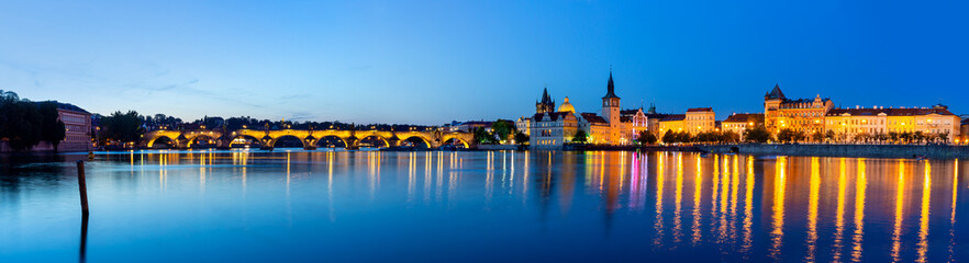 Fototapeta na wymiar panoramic view of Prague with Charles Bridge at night, Czech Republic