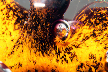 Macro Close Up of Inside a Paperweight Bubbles Glass Red Lava 