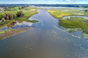 Aerial view of the river. The rural landscape on a summer sunny day