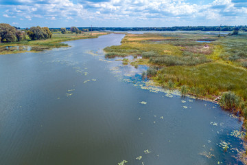 Aerial view of the river. The rural landscape on a summer sunny day