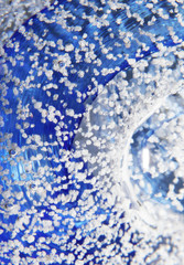 Macro Close Up of Inside a Paperweight Bubbles Glass Blue Water