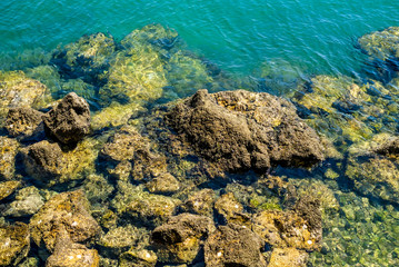 rocks in the water on the coast, coastal landscape of Algarve, Portugal