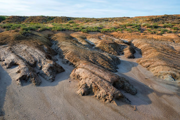 View of soil erosion near saline lake Baskunchak, Russia