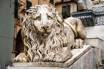 Close-up of one of the lions placed on the sides of the staircase of the medieval Cathedral of St Lawrence (9-14th centuries), by the sculptor Carlo Rubatto (1840), Genoa, Liguria, Italy