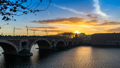 Fototapeta na wymiar Pont Neuf at sunset in Toulouse, France.