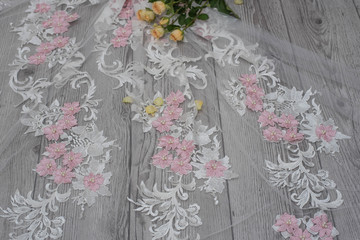 The texture of lace on wooden background