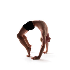 Yoga alphabet. The letter O formed by gymnast body