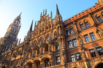 Historical building of New Town Hall (Neues Rathaus - built 1874.) on Marienplatz in Munich (Munchen), Bavaria, Germany, late in the afternoon, lit by strong side lighting form setting sun.