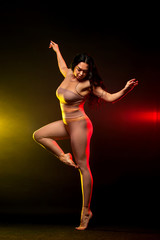 SIze plus woman, ballydance dancer. Ethnic dance. Belly dancing. Tribal dancing.