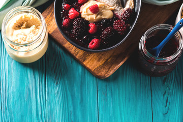 Chia pudding made with plant milk. Healthy breakfast with berries and nut butter.