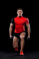 Muscular fitness sports man, atlete with dumbbell in fitness gym. Energy and power.