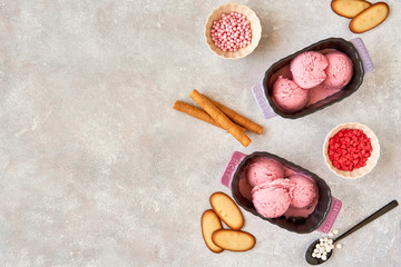Berry pink ice cream with serving ingredients. Top view , copy space