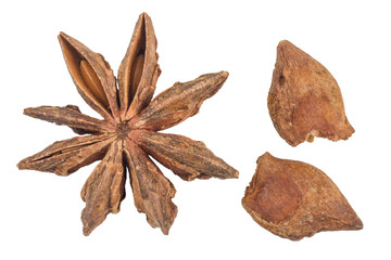Top view of dry star anise fruit and seeds isolated on white