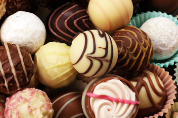 a lot of variety chocolate pralines, belgian confectionery gourmet chocolate praline.