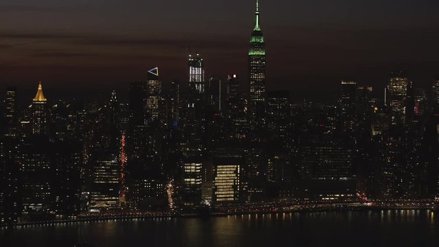 Aerial, night time skyline in New York City