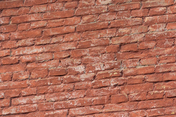 Old red brick wall. Texture and background