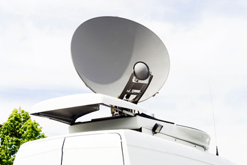 satellite parabolic antenna dish in van for news