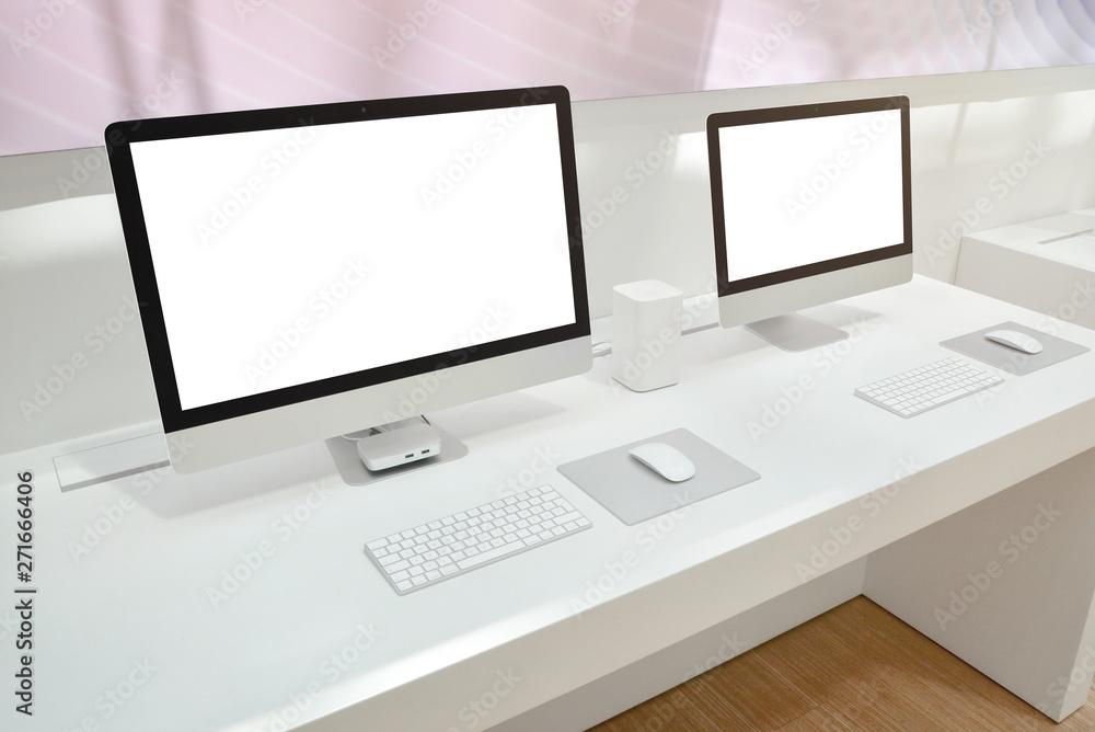 Aufkleber two computers with isolated screens for mockup on office desk.