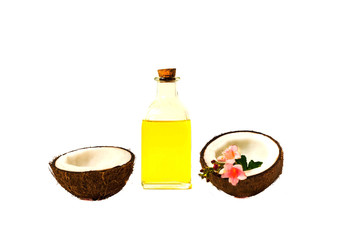 Coconut oil and fresh coconuts isolated on white background.