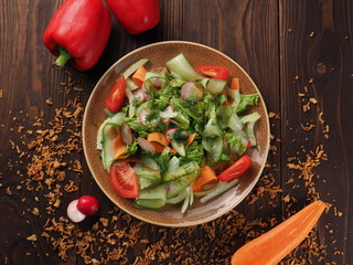 Fresh vegetable salad in a plate on the table