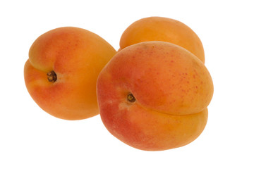 heap of apricots isolated on white