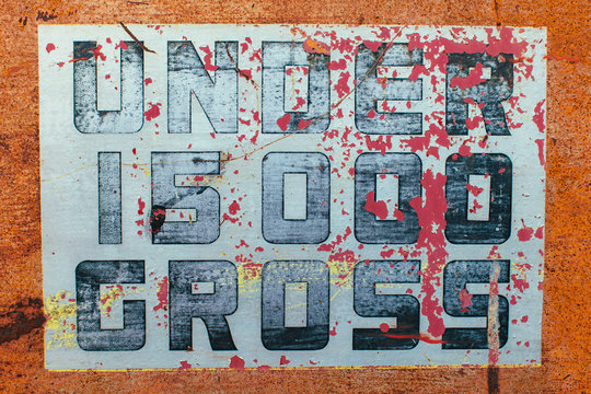 Under 15000 Gross sign painted on side of old truck,Painted sign on side of old truck door