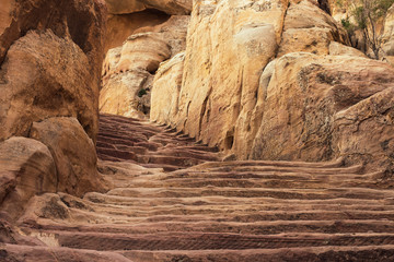 sand stone canyon rocky stairway to top point of mountain in Middle East highland natural environment 